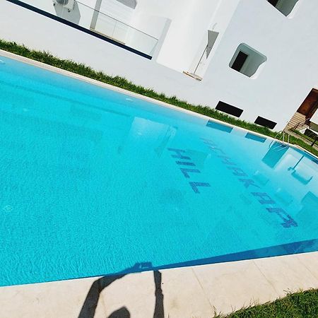Appartement Avec Piscines, Vue Sur Mer Et Acces A La Plage A Achakar Hill, Tanger. Exterior photo
